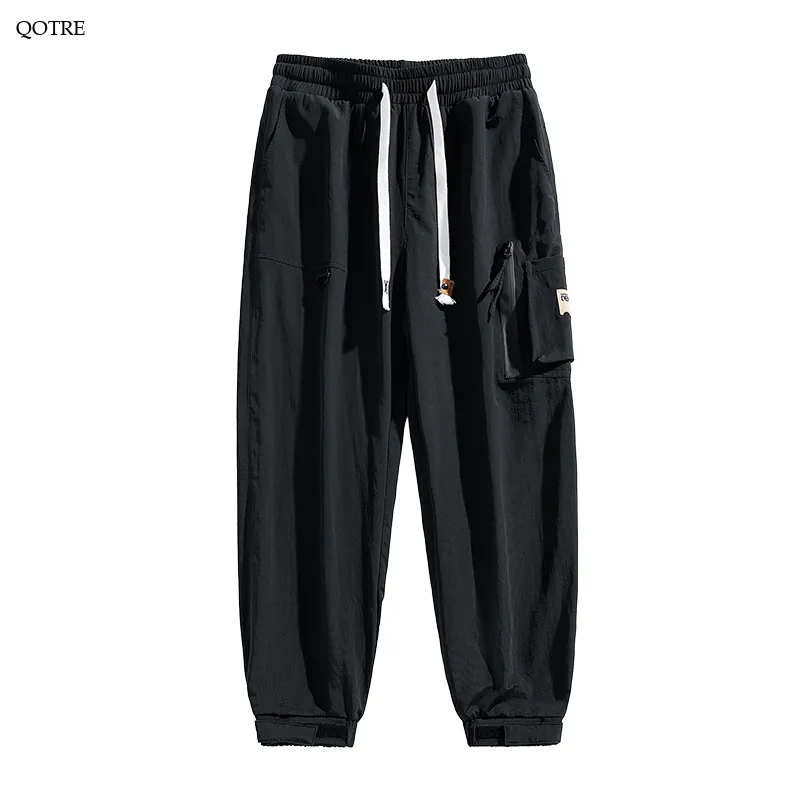 Elasticity Multi-Pocket Zipper Tapered Pants