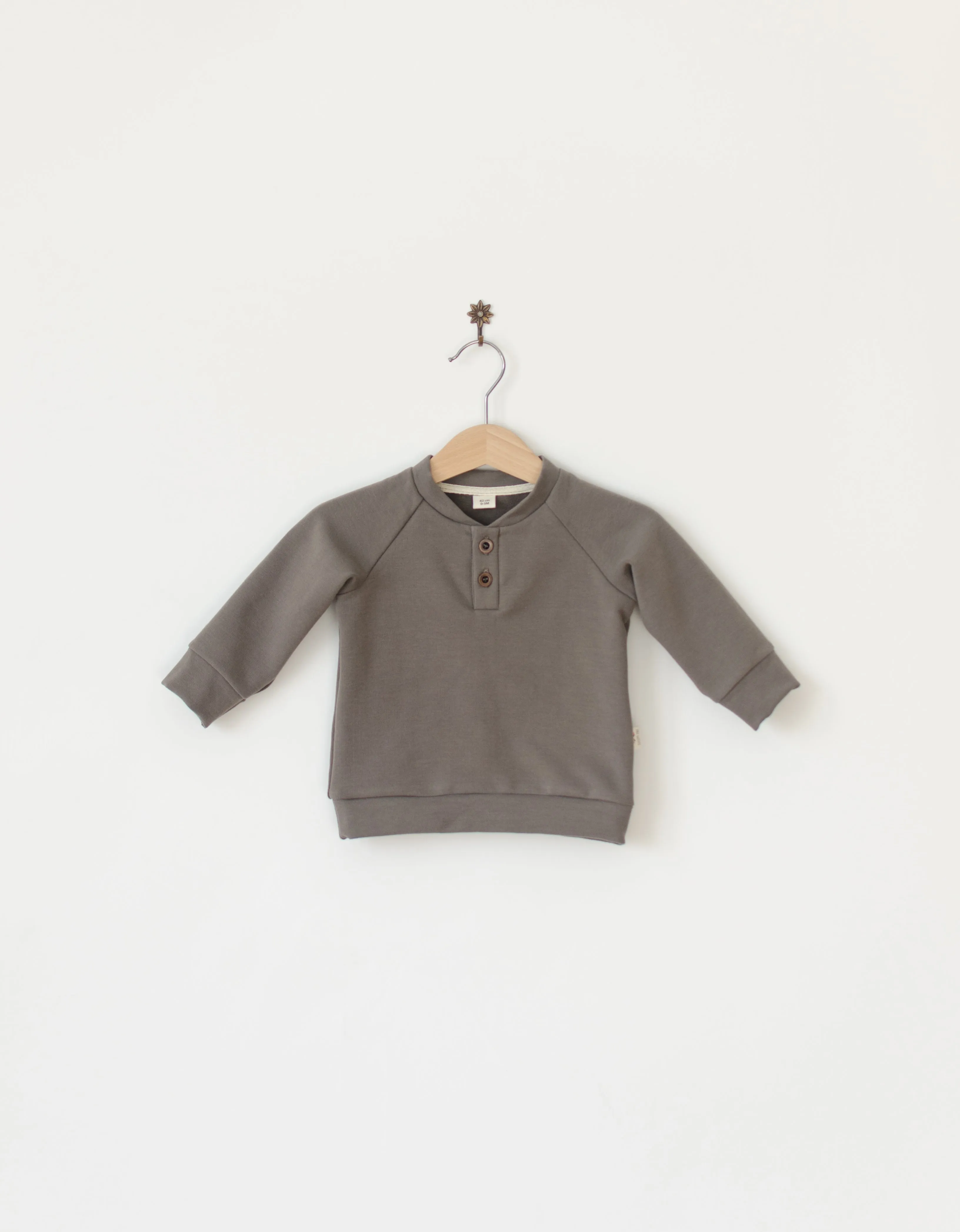 Placket neck sweater