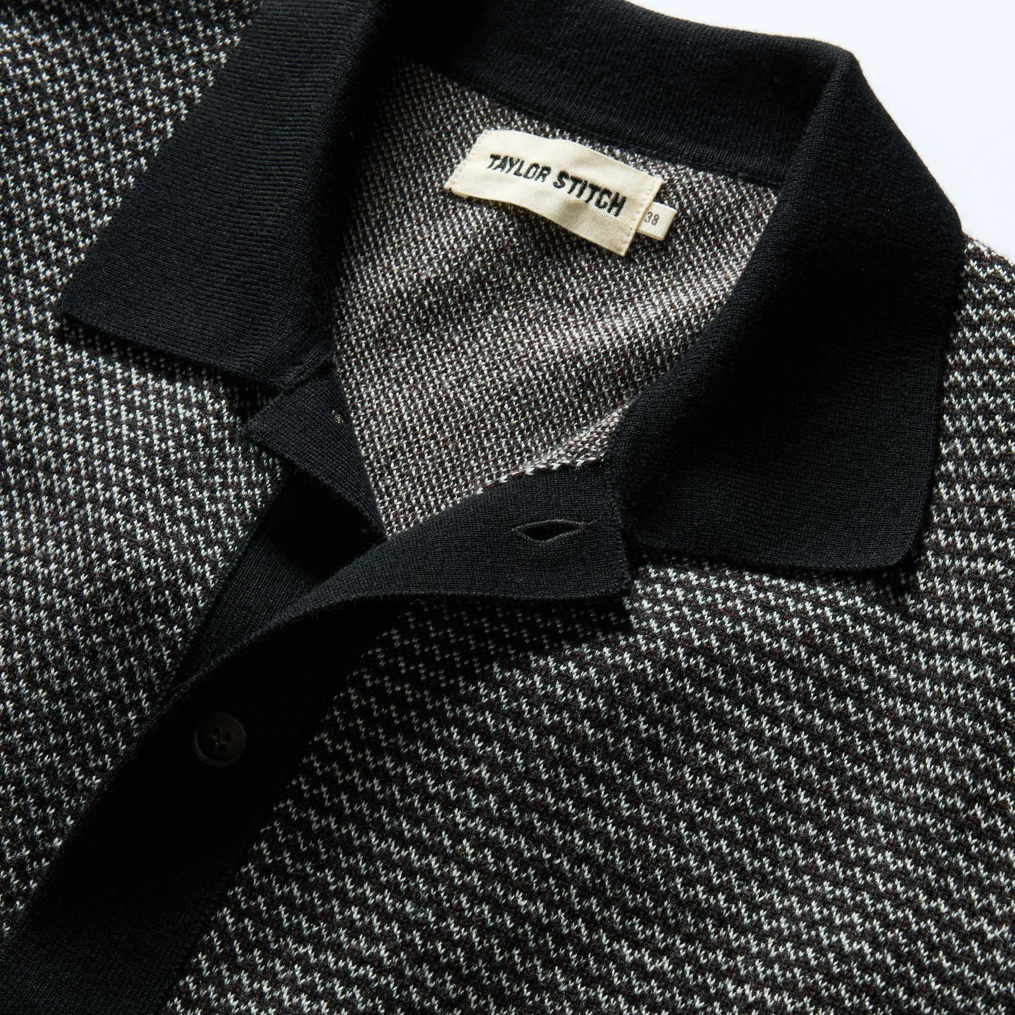 The Nichols Polo in Black Birdseye Merino