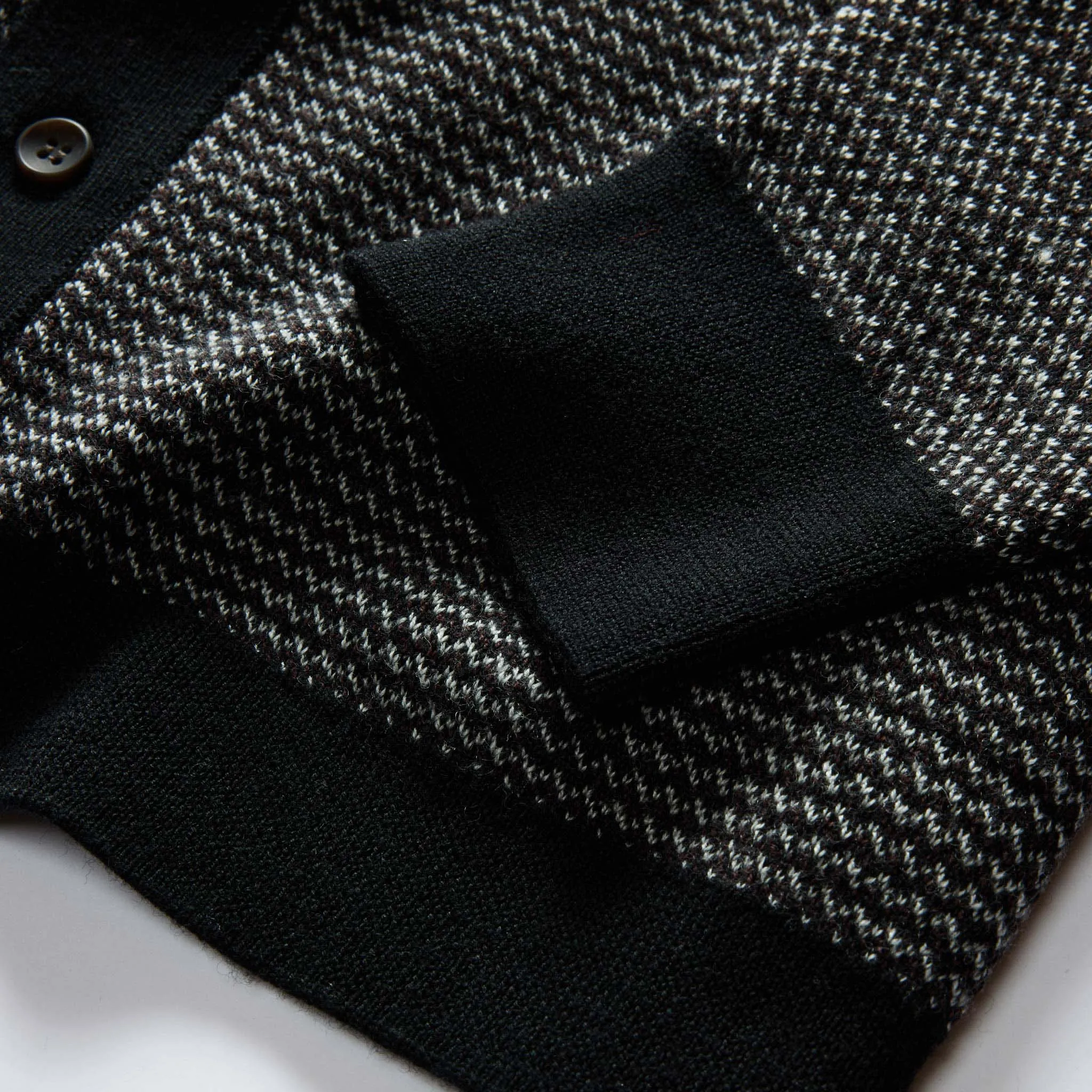 The Nichols Polo in Black Birdseye Merino